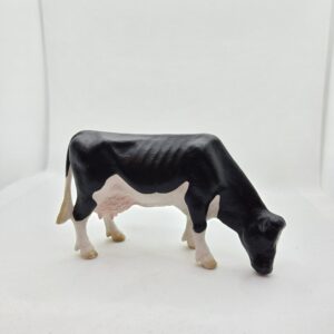 Vache Prim'Holstein broutante 13141 - Schleich