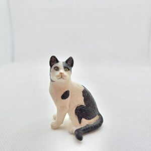 Chat noir et blanc assis 13637 - Schleich