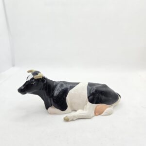 Vache Prim'Holstein couchée 13211 - Schleich